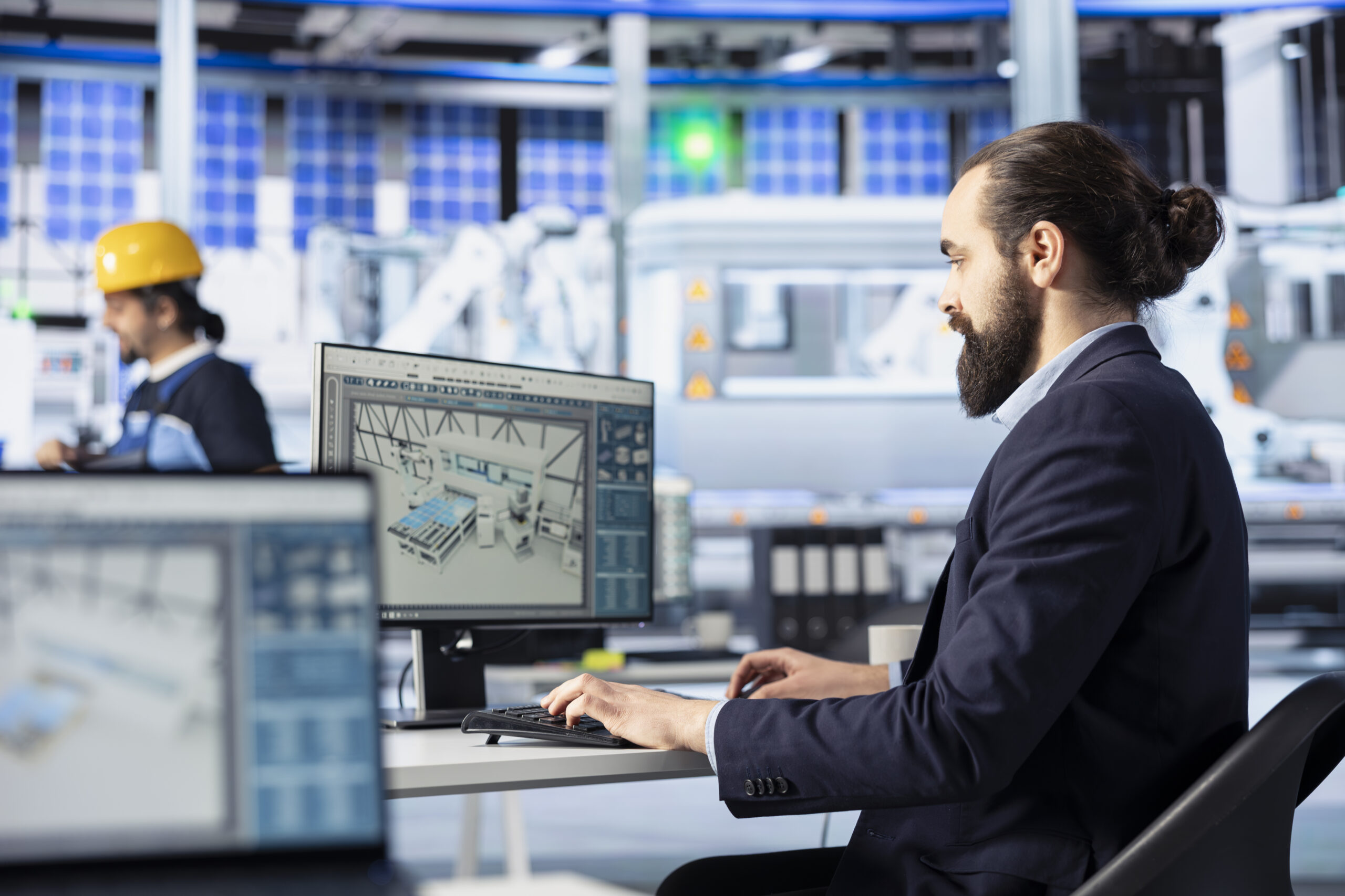 Photovoltaics factory engineer creating solar panel CAD models